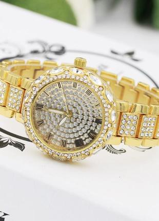 Жіночий наручний годинник із камінням5 фото
