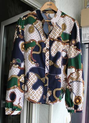 Стильная блуза с ярким принтом2 фото