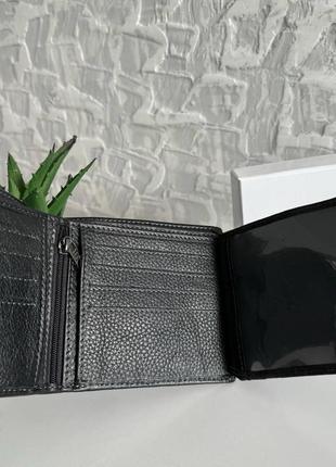 Чоловічий шкіряний гаманець портмоне на кнопки md чорний гаманець4 фото