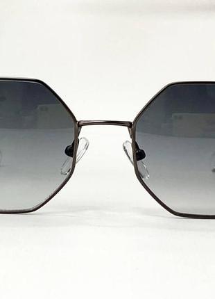 Солнцезащитные очки унисекс многоугольные в металлической оправе с тоненькими дужками2 фото