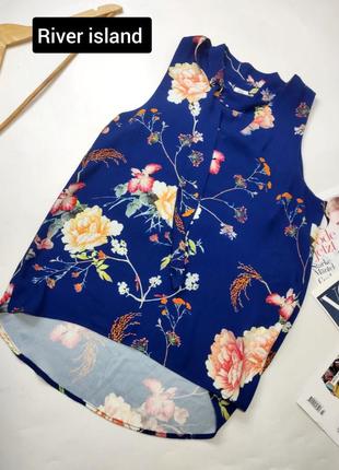 Блуза жіноча синього кольору в квітковий принт без рукавів прямого крою від бренду river island 121 фото