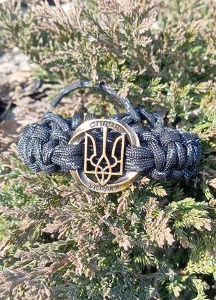Патриотический браслет из светоотражающего паракорда с гербом украины3 фото