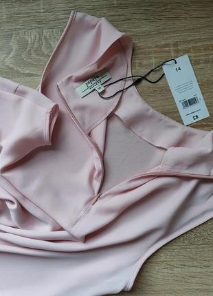 Удлиненная блузка бледно розового цвета с боковыми разрезами6 фото