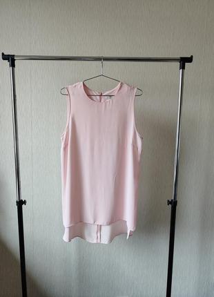 Удлиненная блузка бледно розового цвета с боковыми разрезами1 фото
