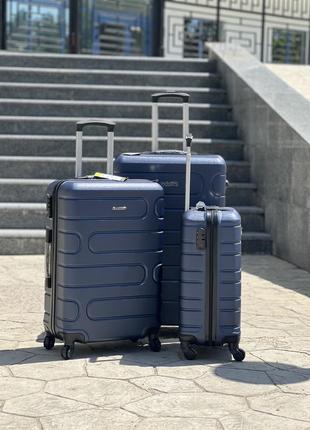 Ударопрочный пластиковый большой чемодан дорожный l на колесах 110 литров2 фото