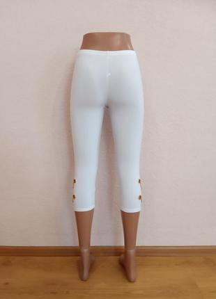 Білі жіночі легінси зі штучної тканини,
розмір  s4 фото