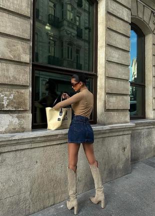 Женская джинсовая качественная короткая юбка мини с распорками спереди4 фото