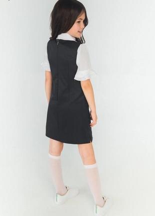 Черный школьный сарафан с накладными карманами3 фото