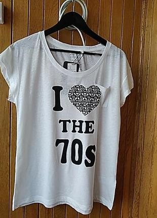 Футболка в розмірах