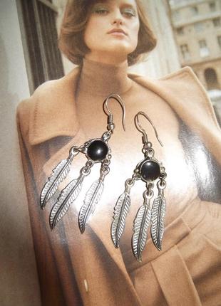 Сережки пір'я