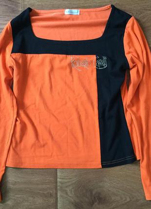 Реглан оранжевого цвета