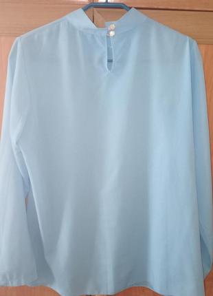 Женская блузка голубая2 фото
