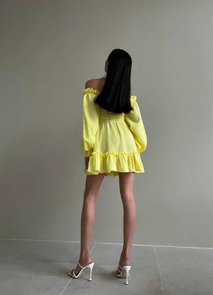 Коротка муслінова сукня з довгими об'ємними рукавами з рюшами з зав'язками на грудях з корсетною резинкою на спині3 фото