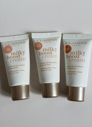 Рассматривающий тональные крема миниатюры clarins milky boost5 фото