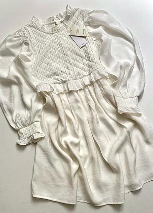 Біла сукня з об’ємними рукавами/рюшами/воланами манго/mango