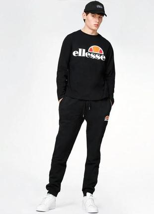 Спортивний чорний костюм ellesse