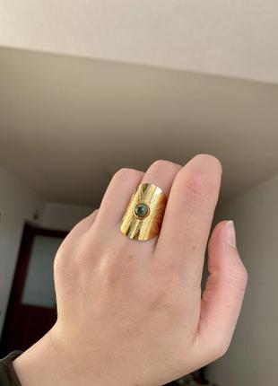 Эффектное нержавеющее кольцо с натуральным камнем10 фото