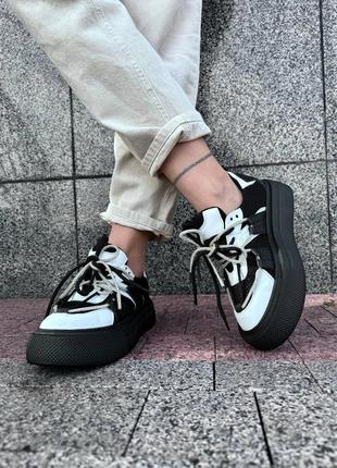 Натуральні шкіряні чорні кеди - кросівки зі вставками сітки на високій підошві4 фото