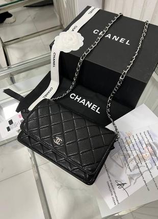 Чорна шкіряна сумка клатч