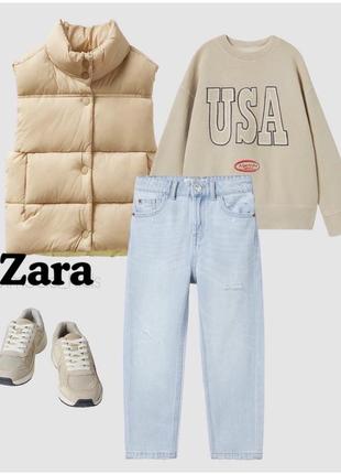 Красива утеплена жилетка zara.2 фото