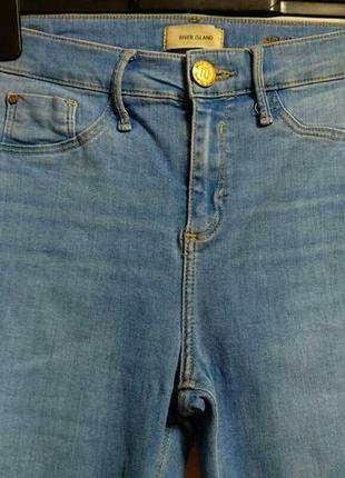 Стрейч стильные джинсы с необработанными краями размера m5 фото
