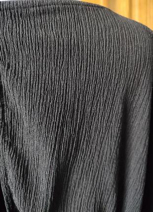 Комбинезон черный с бело- черной горловиной широкая штанина фактурный материал батал7 фото