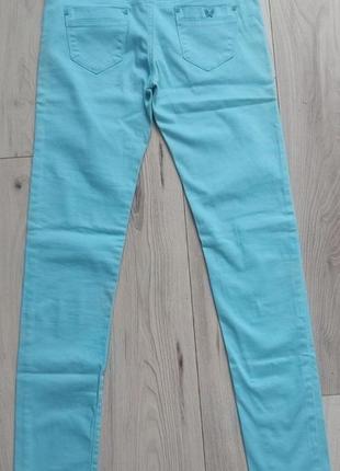Женские голубые брюки 29 размера и зеленого
цвета 26,27 и 28 размера5 фото
