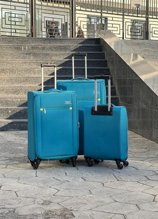 Облегченный  большой чемодан дорожный тканевый l на колесах  с подшипником3 фото