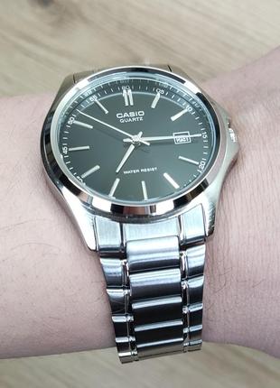 Чоловічий годинник casio mtp-1183pa-1aef2 фото