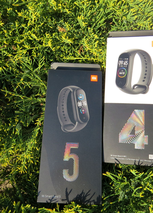 Фітнес часи xiaomi mi band 4 та xiaomi mi band 54 фото