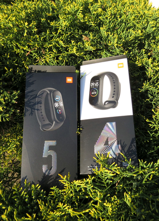 Фітнес часи xiaomi mi band 4 та xiaomi mi band 55 фото