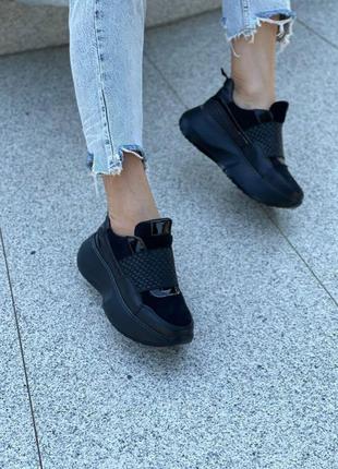 Чорні стильні жіночі кросівки5 фото