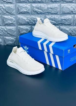 Кросівки adidas жіночі, літні легкі повітропроникні кросівки адід9 фото