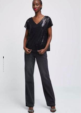 Блузка з паєтками вільного крою