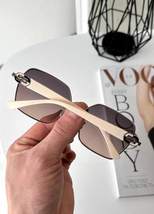 Сонцезахисні жіночі окуляри металева оправа квадратні4 фото