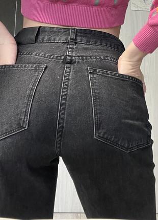 Черные клешевые джинсы6 фото