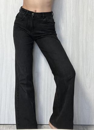 Черные клешевые джинсы7 фото