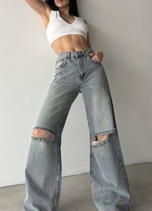Джинсы трубы с разрезами