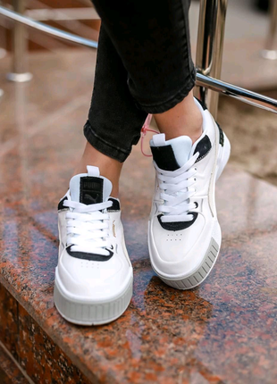 Кросівки жіночі
puma cali sport heritage w shoes white8 фото