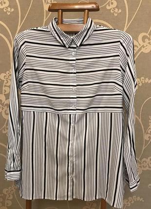 Дуже гарна і стильна брендовий блузка в смужку.