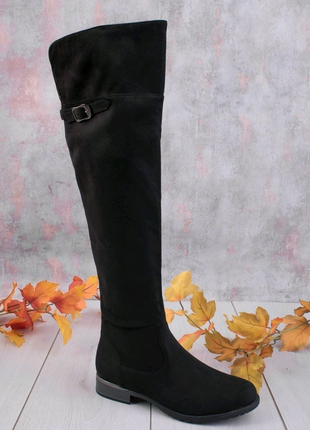 Жіночі чорні ботфорти на низьких підборах2 фото