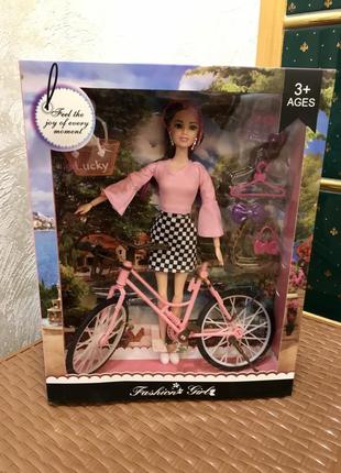 Лялька з велосипедом і улюбленцем. лялька типу барбі з аксесуарам