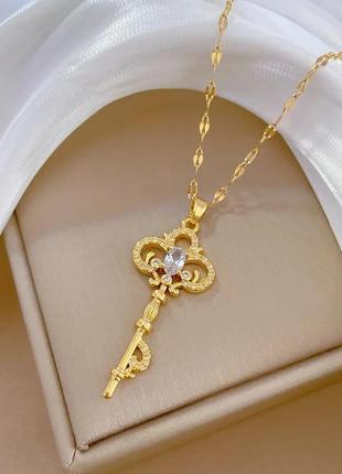 Кулон на цепочке liresmina jewelry эксклюзивный золотой ключик с белыми фианитами 4.2 см золотистый4 фото