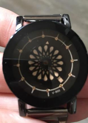 Часы supermassive black с вращающимся циферблатом3 фото