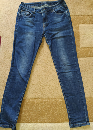Жіночі джинси синього кольору3 фото