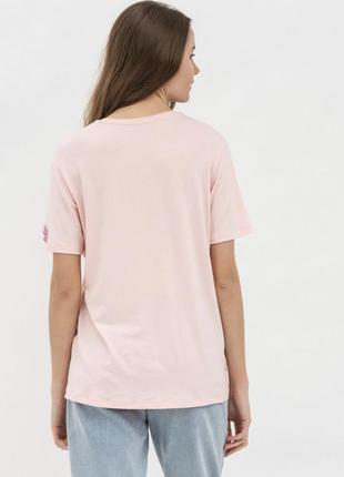 Розовая трикотажная футболка свободного кроя.2 фото