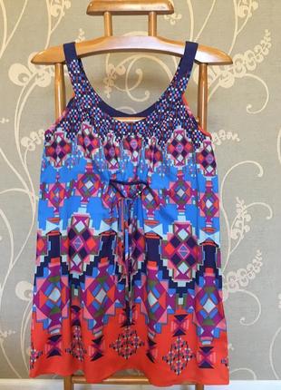 Очень красивая и стильная брендовая разноцветная блузка.