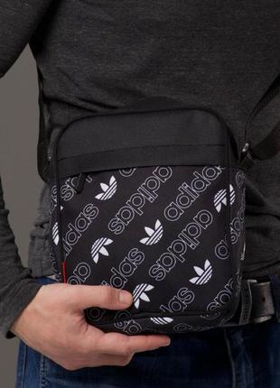 Мужская сумка мессенджер adidas через плечо черная1 фото