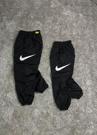 Найлоновые брюки nike nylon pants side swoosh нейлоновые брюки найк бег свиш