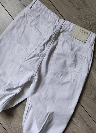 Белые рваные джинсы4 фото
